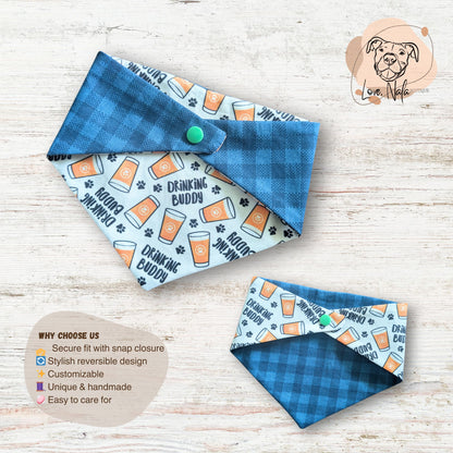 Two dog bandanas with different patterns on a wooden surface. One side features beer glasses, paw prints and the text 'drinking buddy'. The other side is a crisp blue checkered print