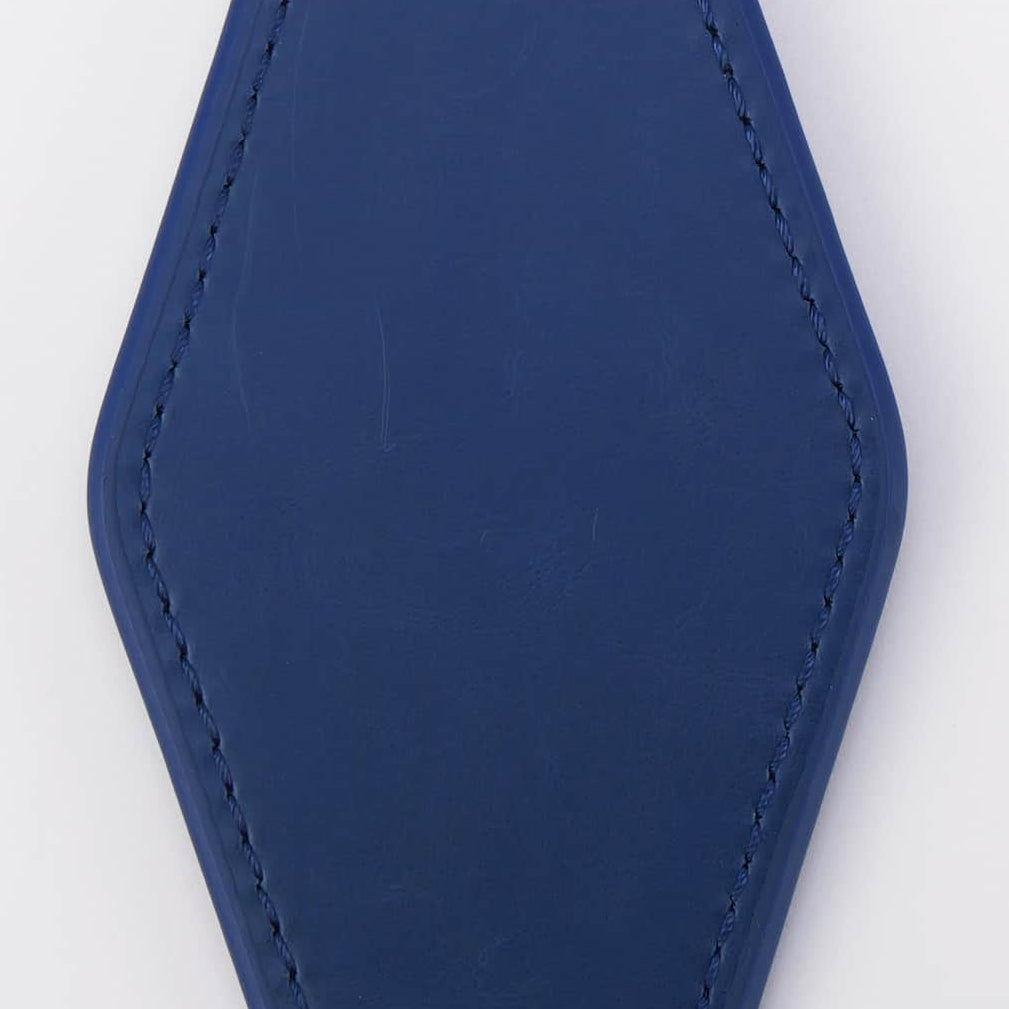 Blue keychain with a metallic ring on a white background