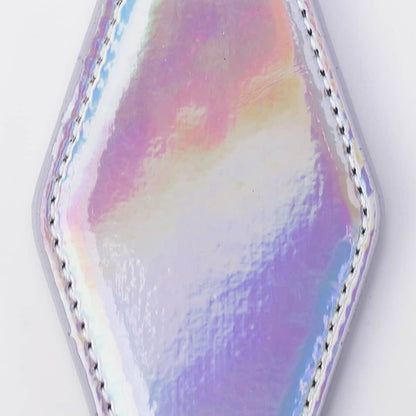 An iridescent holographic keychain with a hexagonal pendant, silver stitched edges, and black metal key rings on a plain white background.