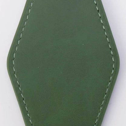 An olive green faux leather keychain tag with white contrast stitching, attached to a black metal carabiner and two silver key rings, shown on a plain white background.