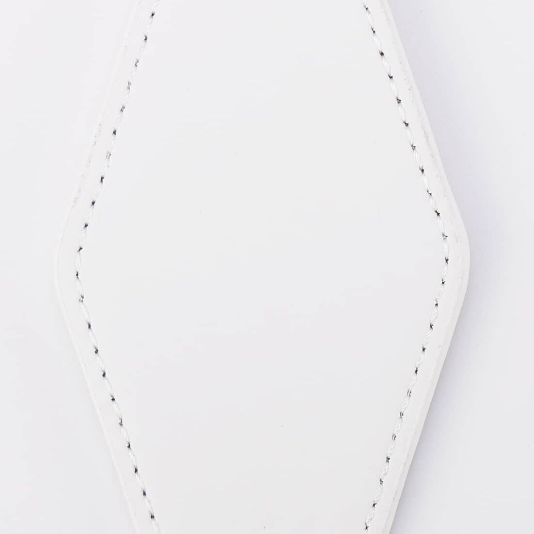 White leather keychain with metal clip on a white background