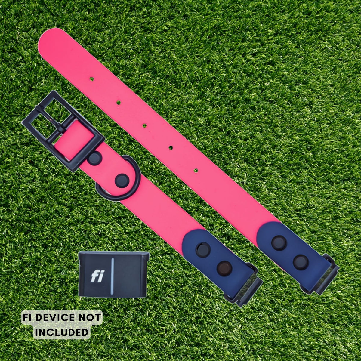 A bright pink dog collar with navy blue end sections and black hardware, laid flat on green grass. A small black FI device is shown separately, with text reading 'FI DEVICE NOT INCLUDED'.