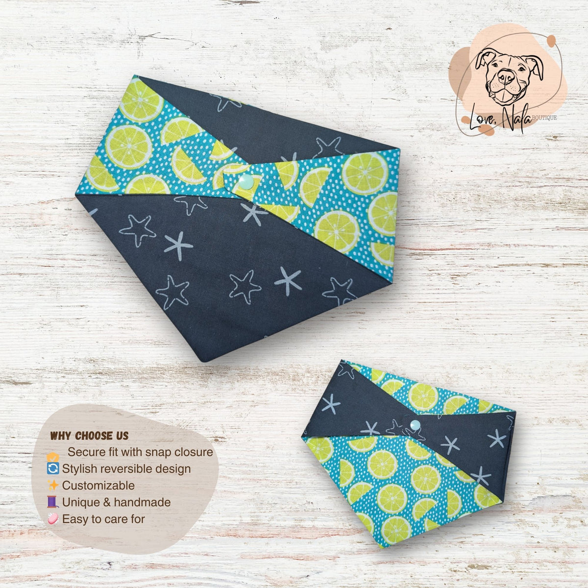 Two dog bandanas with reversible patterns on a wooden surface, featuring a small dog illustration in the corner. The bandana features starfish and limes for a summer feel