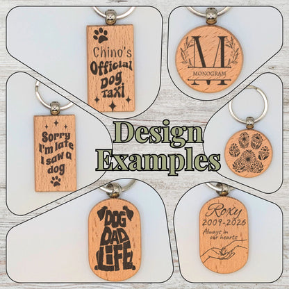 A collage showing six engraved wooden keychain/tag designs on a light wood background, with large central text reading 'Design Examples.' The tags include monogram, paw print, and memorial-style engravings such as 'Chino's Official Dog Taxi,' 'Sorry I'm late I saw a dog,' 'Dog Dad Life,' and 'Roxy 2001-2026 Always in my hearts.